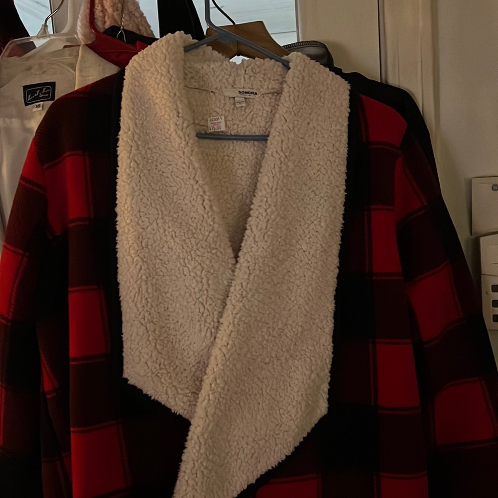 Size large plaid flannel with mock sheep skin inside